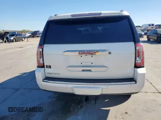 2015 GMC Yukon Denali z VIN 1GKS2CKJ6FR706151, wystawiony jako Copart lot #50556805 z przebiegiem 174 259 mil mil oraz Czysty tytuł • Clean title. Historia ofert i sprzedaży dostępna na DreamBid. Obrazek 6.