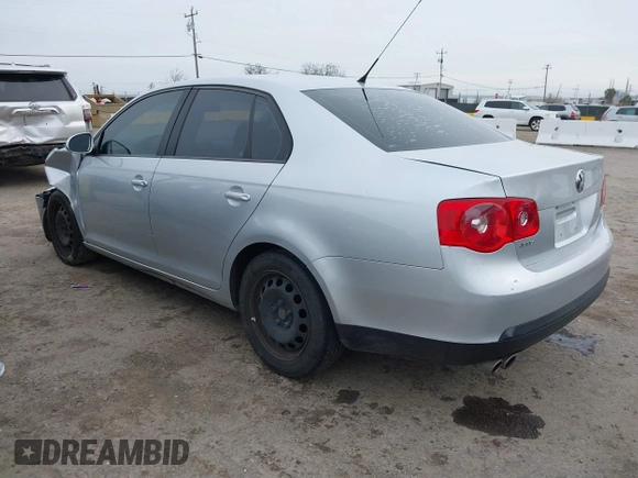 2010 Volkswagen Jetta Sedan S with VIN 3VWJZ7AJ1AM003298, listed as a IAAI auction lot 41583771 with 127,234 mi miles. Bid and sale history available at carsss.com. Image 3.