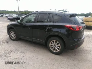 2014 Mazda CX-5 Touring z VIN JM3KE2CYXE0429149, wystawiony jako IAAI lot #42471772 z przebiegiem 222 440 mil mil oraz . Historia ofert i sprzedaży dostępna na DreamBid. Obrazek 3.