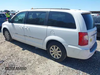 2014 Chrysler Town & Country Touring with VIN 2C4RC1BG9ER148966, listed as a IAAI auction lot 41886625 with 104,299 mi miles. Bid and sale history available at carsss.com. Image 3.