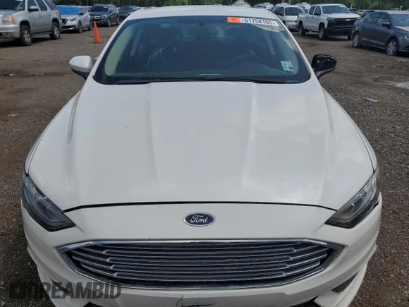 2017 Ford Fusion SE с VIN 3FA6P0H75HR392711, выставлен на аукционе Copart как лот 61758105 с пробегом 166 348 миль миль и Чистый • Clean title. История ставок и продаж доступна на DreamBid. Изображение 5.