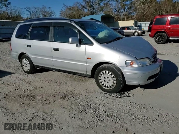 1997 Honda Odyssey with VIN RA11239041, listed as a Copart auction lot 85819024 with 79,952 mi miles and Salvage title. Bid and sale history available at DreamBid. Image 12.