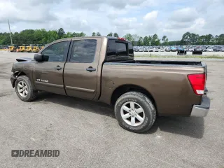 2009 Nissan Titan SE with VIN 1N6BA07D99N302396, listed as a Copart auction lot 59413545 with 181,688 mi miles and Salvage title. Bid and sale history available at DreamBid. Image 2.