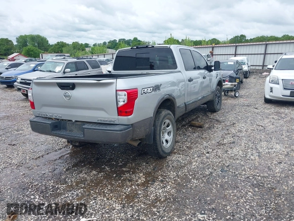 2017 Nissan Titan Pro-4X z VIN 1N6BA1F45HN529090, wystawiony jako IAAI lot #42163486 z przebiegiem 162 226 mil mil oraz . Historia ofert i sprzedaży dostępna na DreamBid. Obrazek 4.