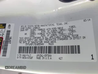 2014 Toyota Tundra 4WD Truck SR with VIN 5TFUM5F17EX055949, listed as a IAAI auction lot 41728783 with 107,019 mi miles. Bid and sale history available at carsss.com. Image 9.