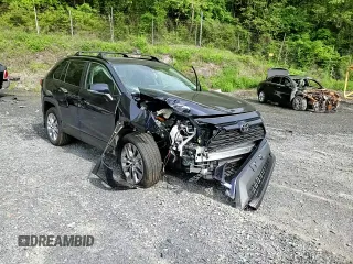 2024 Toyota RAV4 XLE Premium z VIN 2T3A1RFV5RW478819, wystawiony jako Copart lot #56818695 z przebiegiem 14 570 mil mil oraz Szkoda całkowita • Salvage title. Historia ofert i sprzedaży dostępna na DreamBid. Obrazek 14.