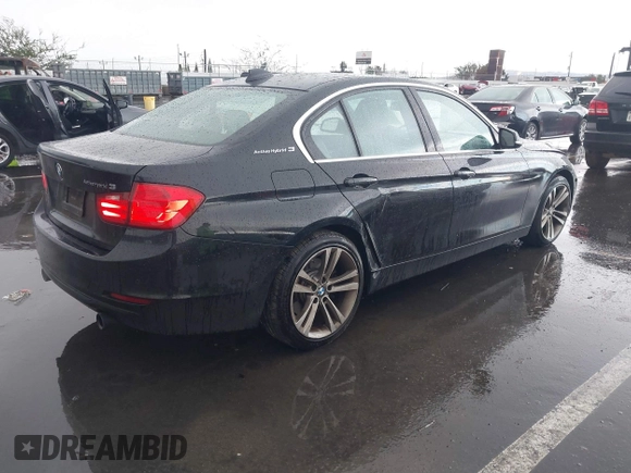 2013 BMW 3 Series ActiveHybrid 3 with VIN WBA3F9C57DF483994, listed as a IAAI auction lot 41797778 with 92,313 mi miles. Bid and sale history available at carsss.com. Image 4.