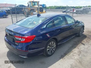 2020 Honda Accord EX-L with VIN 1HGCV3F55LA006332, listed as a IAAI auction lot 42174251 with 69,351 mi miles and . Bid and sale history available at DreamBid. Image 4.