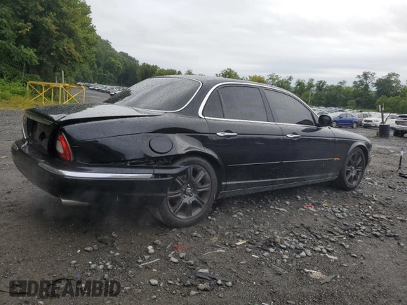 2004 Jaguar XJ with VIN SAJWA71C24SG33915, listed as a Copart auction lot 69626864 with 123,746 mi miles and Non Repairable. Bid and sale history available at carsss.com. Image 3.