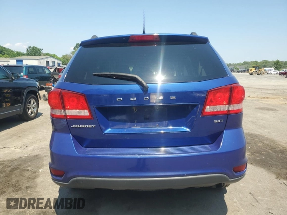 2012 Dodge Journey SXT with VIN 3C4PDCBB6CT324709, listed as a Copart auction lot 63300405 with 179,946 mi miles and Salvage title. Bid and sale history available at DreamBid. Image 6.