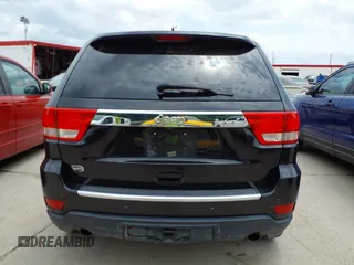 2013 Jeep Grand Cherokee Overland with VIN 1C4RJECT2DC588124, listed as a IAAI auction lot 42142573 with 204,309 mi miles and . Bid and sale history available at DreamBid. Image 16.