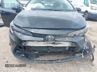 2023 Toyota Corolla LE z VIN 5YFB4MDE7PP060545, wystawiony jako IAAI lot #42379141 z przebiegiem 33 154 mil mil oraz . Historia ofert i sprzedaży dostępna na DreamBid. Obrazek 6.