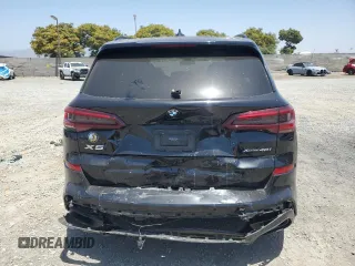 2021 BMW X5 xDrive40i with VIN 5UXCR6C03M9H41831, listed as a Copart auction lot 62145025 with Not provided miles and Salvage title. Bid and sale history available at DreamBid. Image 6.