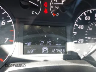2015 Nissan Sentra S with VIN 3N1AB7AP6FY290586, listed as a IAAI auction lot 42014054 with 127,465 mi miles. Bid and sale history available at carsss.com. Image 7.