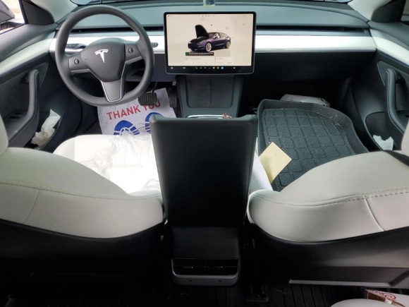 2023 Tesla Model 3 with VIN 5YJ3E1EA1PF678225, listed as a Copart auction lot 62634945 with 24,932 mi miles and Salvage title. Bid and sale history available at DreamBid. Image 8.