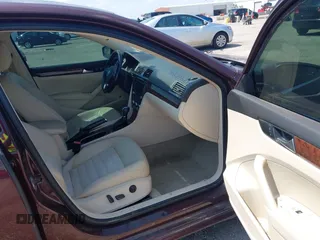 2013 Volkswagen Passat SEL Premium z VIN 1VWCN7A31DC096741, wystawiony jako IAAI lot #42412946 z przebiegiem Nie podano mil oraz . Historia ofert i sprzedaży dostępna na DreamBid. Obrazek 5.