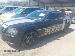 2013 Chrysler 300 with VIN 2C3CCABG1DH709935, listed as a IAAI auction lot 41814279 with 101,174 mi miles. Bid and sale history available at carsss.com. Image 2.