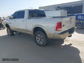 2014 Ram 2500 Longhorn with VIN 3C6UR5GLXEG244401, listed as a IAAI auction lot 41779709 with 180,760 mi miles. Bid and sale history available at carsss.com. Image 3.