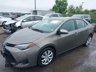 2018 Toyota Corolla L with VIN 2T1BURHE9JC990834, listed as a IAAI auction lot 42583027 with 217,143 mi miles and . Bid and sale history available at DreamBid. Image 17.