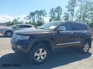 2011 Jeep Grand Cherokee Overland with VIN 1J4RR6GT1BC647292, listed as a IAAI auction lot 42069742 with 199,340 mi miles. Bid and sale history available at carsss.com. Image 17.