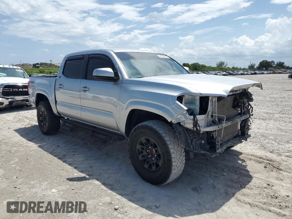 2022 Toyota Tacoma SR with VIN 3TYAX5GN2NT045965, listed as a Copart auction lot 58240835 with 54,231 mi miles and Salvage title. Bid and sale history available at DreamBid. Image 4.