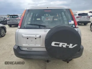 1999 Honda CR-V EX with VIN JHLRD1865XC064542, listed as a Copart auction lot 74730634 with 71,298 mi miles and Salvage Title. Bid and sale history available at carsss.com. Image 6.