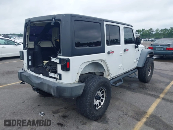 2018 Jeep Wrangler Unlimited Sport S with VIN 1C4BJWDG6JL818719, listed as a IAAI auction lot 42412991 with 58,399 mi miles and . Bid and sale history available at DreamBid. Image 4.