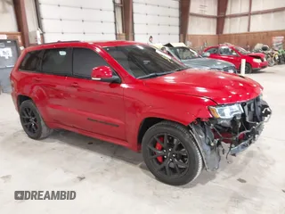 2018 Jeep Grand Cherokee SRT z VIN 1C4RJFDJXJC280505, wystawiony jako IAAI lot #42299828 z przebiegiem 58 879 mil mil oraz . Historia ofert i sprzedaży dostępna na DreamBid. Obrazek 1.