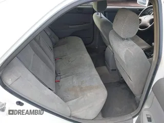 2002 Toyota Camry LE z VIN JTDBE32K120093737, wystawiony jako IAAI lot #41214245 z przebiegiem Nie podano mil oraz . Historia ofert i sprzedaży dostępna na DreamBid. Obrazek 8.