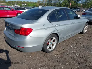 2013 BMW 3 Series 328i xDrive with VIN WBA3B5G56DNS02207, listed as a IAAI auction lot 42213935 with Not provided miles and . Bid and sale history available at DreamBid. Image 4.