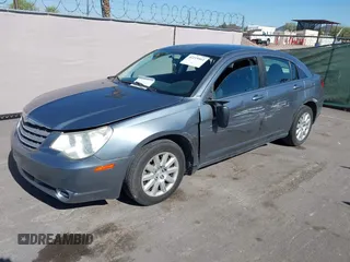 2010 Chrysler Sebring Touring z VIN 1C3CC4FB4AN173629, wystawiony jako IAAI lot #42219561 z przebiegiem 145 054 mil mil oraz . Historia ofert i sprzedaży dostępna na DreamBid. Obrazek 2.