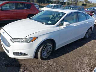 2013 Ford Fusion Titanium with VIN 3FA6P0K90DR248360, listed as a IAAI auction lot 42141987 with 999,999 mi miles. Bid and sale history available at carsss.com. Image 2.