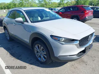 2025 Mazda CX-30 S Premium with VIN 3MVDMBDM2SM798045, listed as a IAAI auction lot 42209070 with 814 mi miles and . Bid and sale history available at DreamBid. Image 1.