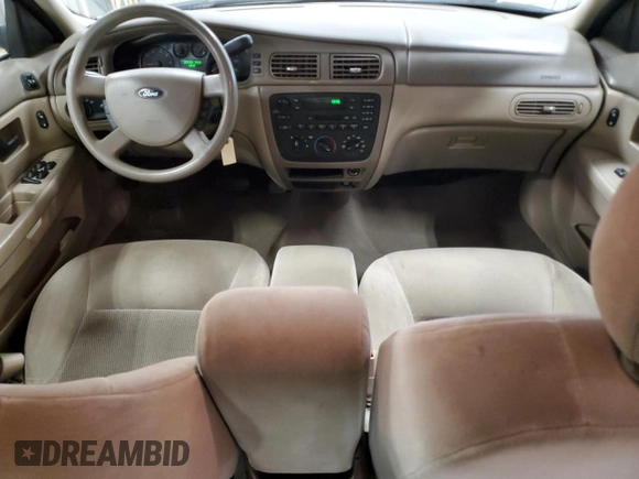 2007 Ford Taurus SE with VIN 1FAFP53U17A150484, listed as a Copart auction lot 56642465 with Not provided miles and Clean title. Bid and sale history available at DreamBid. Image 8.