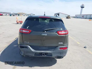 2015 Jeep Cherokee North with VIN 1C4PJMCS9FW588826, listed as a IAAI auction lot 41952883 with 145,586 mi miles. Bid and sale history available at carsss.com. Image 17.