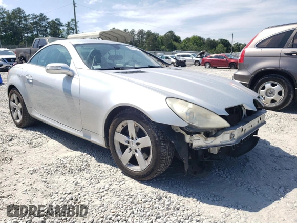 2007 Mercedes-Benz SLK 280 with VIN WDBWK54F47F158590, listed as a Copart auction lot 57837415 with 128,259 mi miles and Salvage title. Bid and sale history available at DreamBid. Image 4.