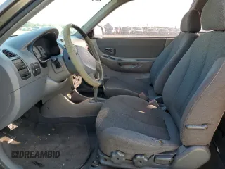 2002 Hyundai Accent GL with VIN KMHCG35C72U192411, listed as a Copart auction lot 85322524 with 130,977 mi miles and Salvage Title. Bid and sale history available at carsss.com. Image 7.