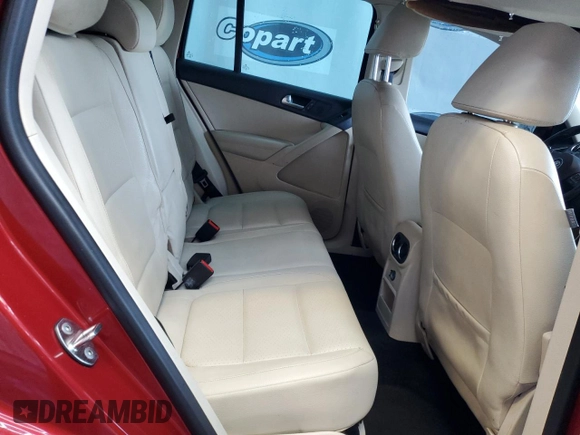 2012 Volkswagen Tiguan SE z VIN WVGAV7AX9CW002143, wystawiony jako Copart lot #55820395 z przebiegiem 174 356 mil mil oraz Czysty tytuł • Clean title. Historia ofert i sprzedaży dostępna na DreamBid. Obrazek 11.