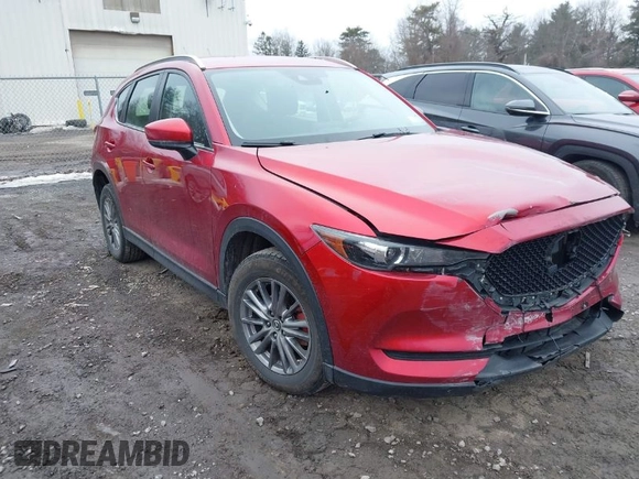 2018 Mazda CX-5 Sport with VIN JM3KFBBM0J0451246, listed as a IAAI auction lot 41698535 with 172,513 mi miles. Bid and sale history available at carsss.com. Image 1.