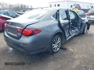 2016 Infiniti Q70 with VIN JN1BY1AR0GM270212, listed as a IAAI auction lot 41889159 with 108,760 mi miles. Bid and sale history available at carsss.com. Image 4.