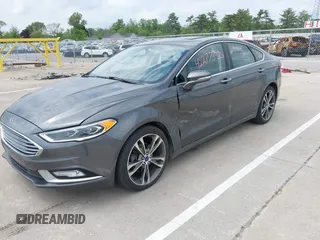 2017 Ford Fusion Titanium with VIN 3FA6P0D93HR261526, listed as a IAAI auction lot 42277350 with 117,388 mi miles and . Bid and sale history available at DreamBid. Image 20.