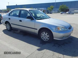 1999 Honda Civic LX with VIN JHMEJ6670XS000958, listed as a IAAI auction lot 41620949 with 93,698 mi miles. Bid and sale history available at carsss.com. Image 1.