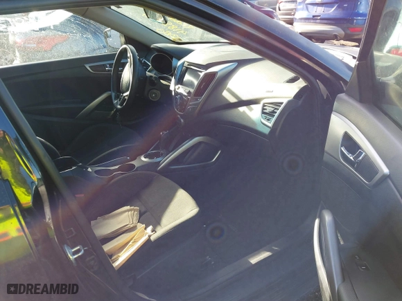 2015 Hyundai Veloster with VIN KMHTC6AD0FU245001, listed as a IAAI auction lot 41881391 with 119,873 mi miles. Bid and sale history available at carsss.com. Image 5.