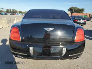 2012 Bentley Flying Spur z VIN SCBBP9ZAXCC076268, wystawiony jako Copart lot #77854304 z przebiegiem 99 103 mil mil oraz Czysty tytuł • Clean title. Historia ofert i sprzedaży dostępna na DreamBid. Obrazek 6.