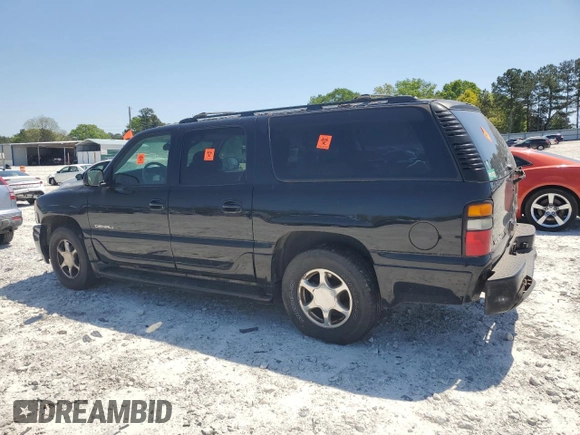 2006 GMC Yukon XL with VIN 1GKFK66U46J165428, listed as a Copart auction lot 52756205 with Not provided miles and Salvage title. Bid and sale history available at DreamBid. Image 2.