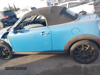 2013 MINI Roadster S z VIN WMWSY3C55DT594628, wystawiony jako IAAI lot #41316950 z przebiegiem 77 399 mil mil oraz . Historia ofert i sprzedaży dostępna na DreamBid. Obrazek 14.