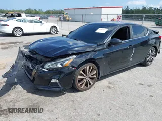 2020 Nissan Altima 2.5 SR with VIN 1N4BL4CV4LC180798, listed as a IAAI auction lot 41985650 with 88,720 mi miles. Bid and sale history available at carsss.com. Image 18.