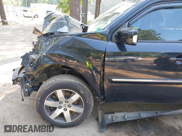 2013 Honda Pilot Touring with VIN 5FNYF3H96DB011470, listed as a IAAI auction lot 42535022 with 201,380 mi miles and . Bid and sale history available at DreamBid. Image 19.
