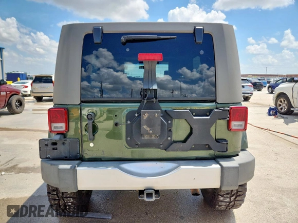 2008 Jeep Wrangler Unlimited Sahara with VIN 1J4GA59148L608970, listed as a Copart auction lot 64433495 with 134,055 mi miles and Salvage title. Bid and sale history available at DreamBid. Image 6.