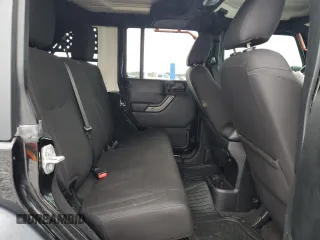 2018 Jeep Wrangler Unlimited Sport S with VIN 1C4BJWDG0JL818800, listed as a Copart auction lot 56648505 with 114,011 mi miles and Salvage Title. Bid and sale history available at DreamBid. Image 10.